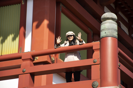 Tokyo, Japan - March 31, 2019 : Travelers thai women travel and portrait posing for take photo at balcony on top of Daitou or Great pagoda of Naritasan Shinshoji Temple at Chiba Prefecture in Tokyo, Japanのeditorial素材