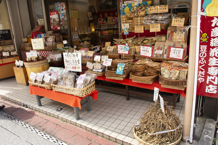 Tokyo, Japan - March 31, 2019 : Local souvenir gift shop in street of Naritasan Omote Sando in Narita old town for travelers people walk shopping and travel visit at Chiba on March 31, 2019 in Tokyo, Japanのeditorial素材