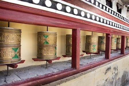 JAMMU KASHMIR, INDIA - MARCH 21 : Big prayer wheels in Diskit Monastery or Deskit Gompa for tibetan rite rotate and spin in Nubra Valley village at Leh Ladakh on March 21, 2019 in Jammu Kashmir, Indiaのeditorial素材