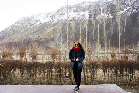 JAMMU KASHMIR, INDIA - MARCH 21 : Travelers thai women standing for take photo at resort hotel in...