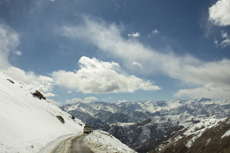 JAMMU KASHMIR, INDIA - MARCH 22 : Indian people driving car on Keylong Leh Road - Leh Manali Highway in Himalaya mountain bring travelers go to Leh Ladakh on March 22, 2019 in Jammu and Kashmir, Indiaのeditorial素材