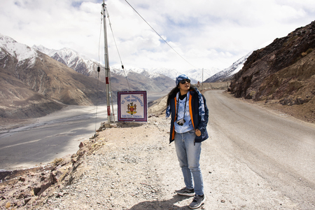 JAMMU KASHMIR, INDIA - MARCH 20 : Travelers thai woman travel visit stand for take photo between journey go to Nubra lake and valley village at Leh Ladakh on March 20, 2019 in Jammu and Kashmir, Indiaのeditorial素材