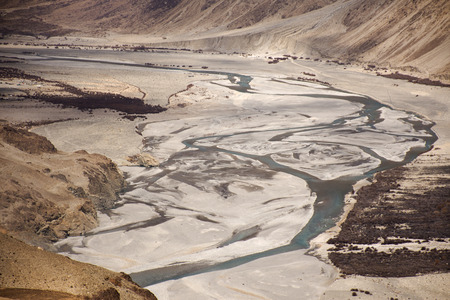 JAMMU KASHMIR, INDIA - MARCH 20 : View landscape at viewpoint mountains range with nubra river when evaporated dry at Leh Ladakh while winter season on March 20, 2019 in Jammu and Kashmir, Indiaのeditorial素材