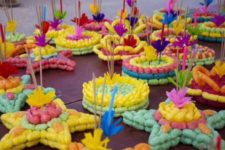 Colorful art fish food floating or buoyant for thai people select buy and into river, canal and pond...