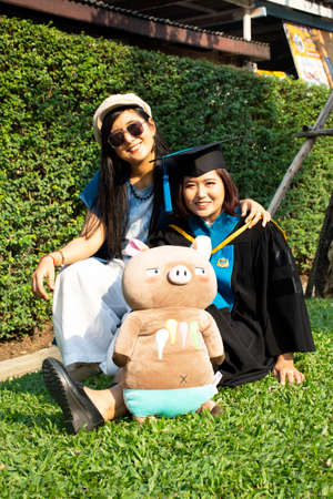 BANGKOK, THAILAND - FEBRUARY 20 : Thai relatives and friends join and congratulations with students in commencement day of graduation ceremony at Nonthaburi on February 20, 2020 at Bangkok, Thailandのeditorial素材