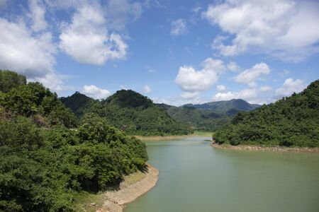 View landscape of Bang Lang Reservoir and Pattani Dam with mountain and forest at Bannang Sata District of Yala Province, Thailandの写真素材