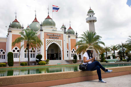 PATTANI, THAILAND - August 16 : Travelers thai women travel visit and pose portrait for take photo in Central Mosque or Masjid klang of Pattani at southern of thai August 16, 2019 in Pattani, Thailandのeditorial素材