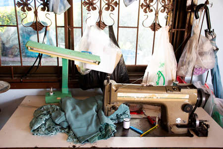 PHATTHALUNG, THAILAND - AUGUST 20 : Classic vintage antique retro sewing fabric machine for thai people work at home and repair clothes at house countryside on August 20, 2019 in Phatthalung, Thailandのeditorial素材