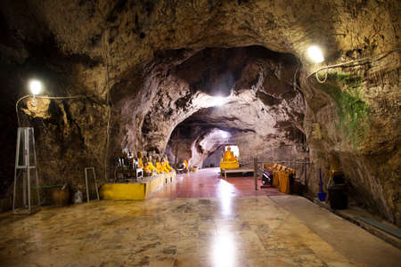 PHATTHALUNG, THAILAND - AUGUST 20 : Buddha god angel and hermit statue in cave for thai people visit and respect or praying at Wat Khao Orr or Kao Or temple on August 20, 2019 in Phatthalung, Thailandのeditorial素材