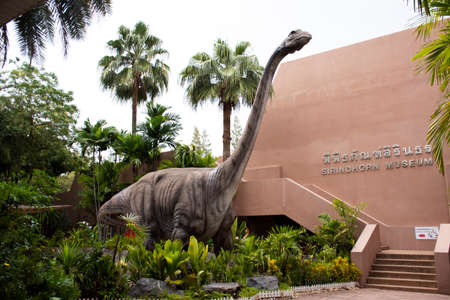 KALASIN, THAILAND - OCTOBER 2 : Dinosaur model in Sirindhorn Museum and Phu Kum Khao Dinosaur Excavation Site for travelers people travel visit at Sahatsakhan on October 2, 2019 in Kalasin, Thailandのeditorial素材