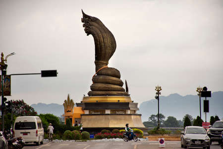 NAKHON PHANOM, THAILAND - OCTOBER 2 : Naga 9 head big statue at riverside of Mekong for foreign traveler and thai people travel visit and respect praying on October 2, 2019 in Nakhon Phanom, Thailandのeditorial素材