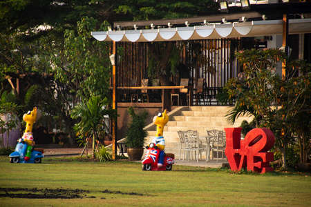MUKDAHAN, THAILAND - OCTOBER 2 : Exterior decoration furniture of garden outdoor for travelers and guest travel visit and relax rest at luxurior resort hotel on October 2, 2019 in Mukdahan, Thailandのeditorial素材