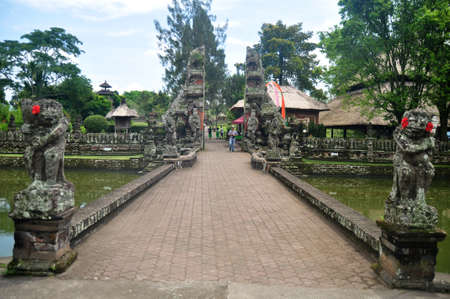BALI, INDONESIA - MARCH 24 : Ancient roadbridge crossing canal go to entrance of Pura Taman Ayun or Mengwi Temple for travelers people travel visit at Badung city on March 24, 2018 in Bali, Indonesiaのeditorial素材