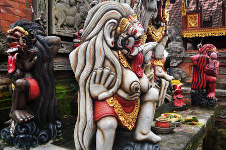 Art sculpture and carved antique deity angel god of hindu statue balinese style in Pura Ulun Danu Bratan or Pura Bratan Hindu Shaivite Shiva temple in Bratan near Bedugul in Bali, Indonesiaのeditorial素材