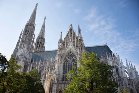 Beautiful Votivkirche cathedrals or Votive Church on the Ringstrasse for Austrians people and foreigner travelers travel visit and respect praying god in Vienna, Austriaのeditorial素材