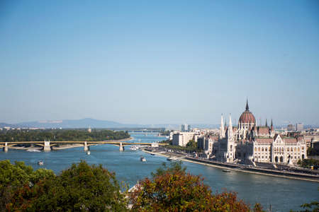 View landscape and cityscape of Budapest old town city and Hungarian Parliament with tour cruises in Danube Delta river and Budapest Chain Bridge in Budapest, Hungaryのeditorial素材