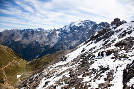 Viewpoint and road on Stelvio Pass or Passo dello Stelvio or stilfser joch in Alps for Italian and foreign travelers travel visit and look view of alp at Bormio on September 13, 2019 in Sondrio, Italyの写真素材