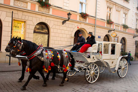 Polish wait and ride horse drawn carriages for Pole people and foreigner travelers use service tour...