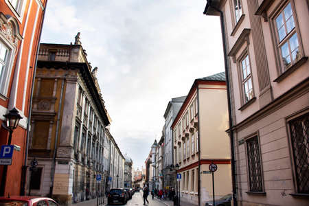 Polish or Pole people and foreigner travelers travel visit walking in small alley with Classic retro vintage antique building in Krakow Old Town at Stare Miasto on September 20, 2019 in Lesser, Polandのeditorial素材