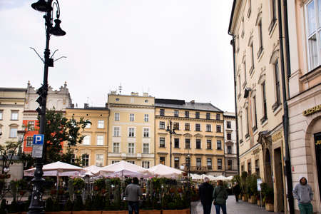 Polish or Pole people and foreigner travelers travel visit and shopping eat drink relax at Rynek Glowny Market in Krakow Old Town Main Square at Stare Miasto on September 20, 2019 in Lesser, Polandのeditorial素材