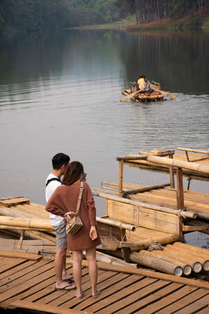 Rafting boat bamboo port for receive thai people and foreign travelers passengers tour Pang Ung lake in Pang Oung forest park at Ban Rak Thai on February 28, 2020 in Mae Hong Son, Thailandのeditorial素材