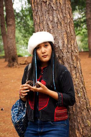 Travelers thai women journey travel visit and take photo between tour at Pang Ung lake in Pang Oung forest park or Switzerland of Thailand  in Chinese village Ban Rak Thai in Mae Hong Son, Thailandのeditorial素材