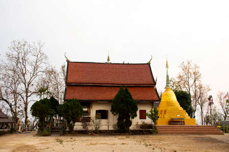 Thai people and travelers foreign travel visit and respect praying buddha statue in Wat Phra That Mae Yen Temple evening time at Pai city valley hill on February 27, 2020 in Mae Hong Son, Thailandのeditorial素材