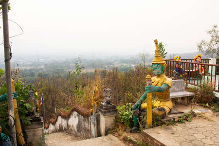 Thai people and travelers foreign travel visit and respect praying buddha statue in Wat Phra That Mae Yen Temple evening time at Pai city valley hill in Mae Hong Son, Thailandのeditorial素材
