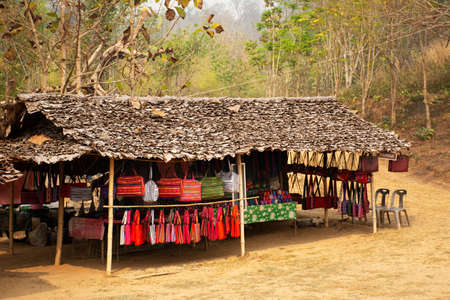 Local folk wisdom and clothes shop for sale thai people traveler in Su Tong Pae bridge of Phu Sa Ma temple while PM 2.5 Dust situation in Ban Kung Mai Sak village at Pai city of Mae Hong Son, Thailandのeditorial素材