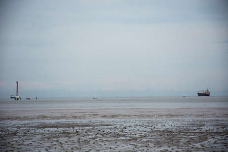 Logistic ship floating on sea and ocean in sea ocean at Bangpu Recreation Center in Samut Prakan, Thailandのeditorial素材