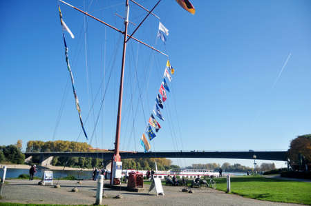German people and foreign travelers walking relax footpath riverside Rhine river and travel visit...