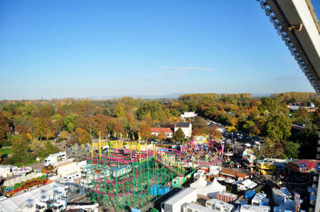 Aerial view landscape cityscape of old town at Speyer from ferris wheels and people travel playing toy amusement park in carnival festival event on October 30, 2016 in Rhineland Palatinate, Germanyのeditorial素材
