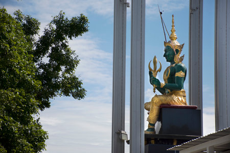Green jade Indra or Deva or Aditya statue Thewalai angel shrine for thai people and foreign travelers travel visit and respect praying at Singburi city in Sing Buri provinces of Thailandの写真素材