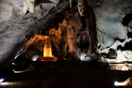 Stalagmite Phra That Nompha in Tham Muang On cave at limestone mountain situated of Mae On for thai people and foreign travelers travel visit respect praying in San Kamphaeng at Chiang Mai, Thailandのeditorial素材