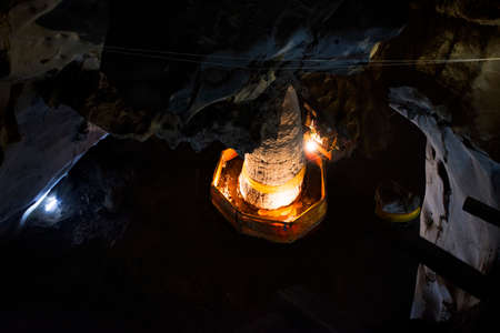 Stalagmite Phra That Nompha in Tham Muang On cave at limestone mountain situated of Mae On for thai people and foreign travelers travel visit respect praying in San Kamphaeng at Chiang Mai, Thailandのeditorial素材