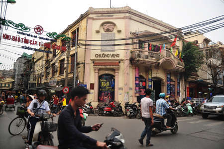 Vietnamese people riding biking driving and foreign travelers walking travel visit old town and...