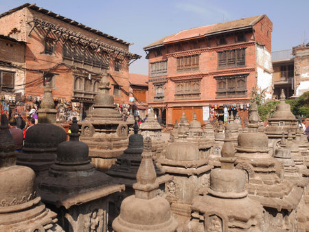 Small stone stupa chedi at Swayambhunath pagoda or Swayambu or Swoyambhu or Monkey Temple for nepali people and foreign traveler travel visit respect praying on December 2, 2017 in Kathmandu, Nepalのeditorial素材