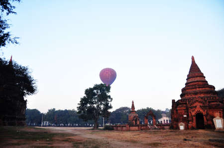 View cityscape of Bagan or Pagan ancient city and landscape UNESCO World Heritage Site and balloon flying bring travelers people looking aerial view on February 4, 2013 in Mandalay, Myanmar or Burmaのeditorial素材