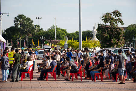 Thai people wait queue with social distancing for meet doctor and nurse inject vaccine Corona virus while Coronavirus COVID 19 outbreak at Sanam Luang Royal Plaza on July 31, 2021 in Bangkok, Thailandのeditorial素材