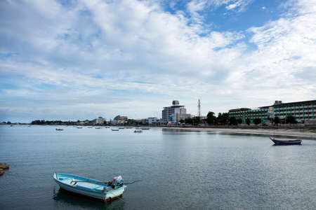 View landscape seascape cityscape and wooden fishing boat floating in sea ocean waiting catch fish and marine life in night of Prachuap bay beach on September 6, 2021 in Prachuap Khiri Khan, Thailandのeditorial素材