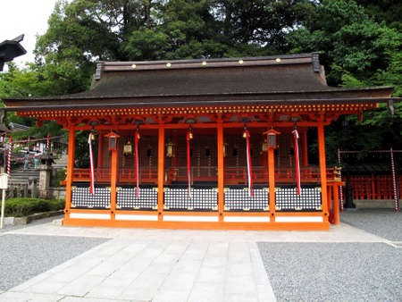 Red orange ancient antique building pavilion church for japanese people and foreign traveler travel visit and respect praying of Fushimi Inari Shrine at Kyoto on July 11, 2015 in Kansai region, Japanのeditorial素材