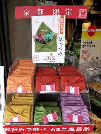 Souvenirs gifts in local hawker shop for japanese people and foreign travelers travel visit and select buy at Hanamikoji Street market in Gion old town at Kyoto City on July 11, 2015 in Kansai, Japanのeditorial素材