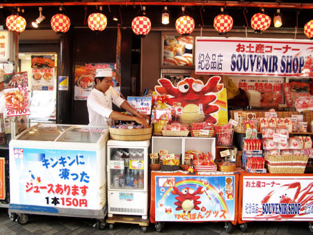 Souvenirs gifts food goods product in local stall grocery store shop for japanese people and foreign traveler travel visit select buy at Arashiyama old town at Kyoto on July 11, 2015 in Kansai, Japanのeditorial素材