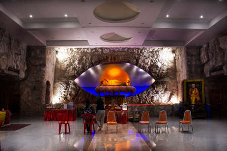 Reclining guanyin or Quan Yin sleep statue for thai people travelers travel visit respect praying of Wat Tham Panyaram Bangmuang temple at Sam Phran City on January 9, 2022 in Nakhon Pathom, Thailandのeditorial素材