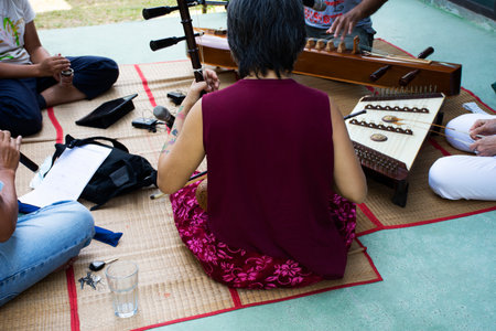 Live band playing traditional thai musical instruments concert for show thai people foreign...