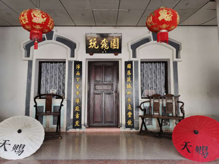 Antique one hundred year vintage house or ancient retro building Baan Thein Suek Museum for thai people travelers travel visit and take photo at Khao Niwet city on October 31, 2022 in Ranong, Thailandのeditorial素材