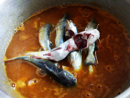 Thai chef cooking food fusion traditional local southern thai food boiled shark catfish or snail...