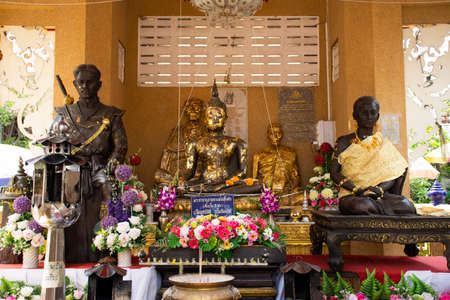 Buddha statue and King Taksin The Great monument for thai people travel visit respect praying blessing holy mystery deity of Wat Sak Yai temple at Bang Kruai on March 15, 2022 in Nonthaburi, Thailandのeditorial素材