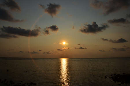 View landscape seascape and sky cloudscape in sea ocean gulf of thailand at sunset dusk time for thai people foreign traveler travel visit rest relax at viewpoint of Koh Chang island in Trat, Thailandの写真素材