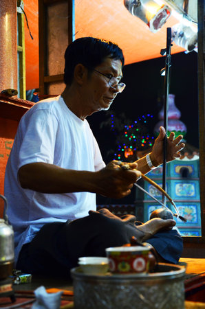 Thai people of chinese descent playing musical instruments sing song for acting traditional chinese...